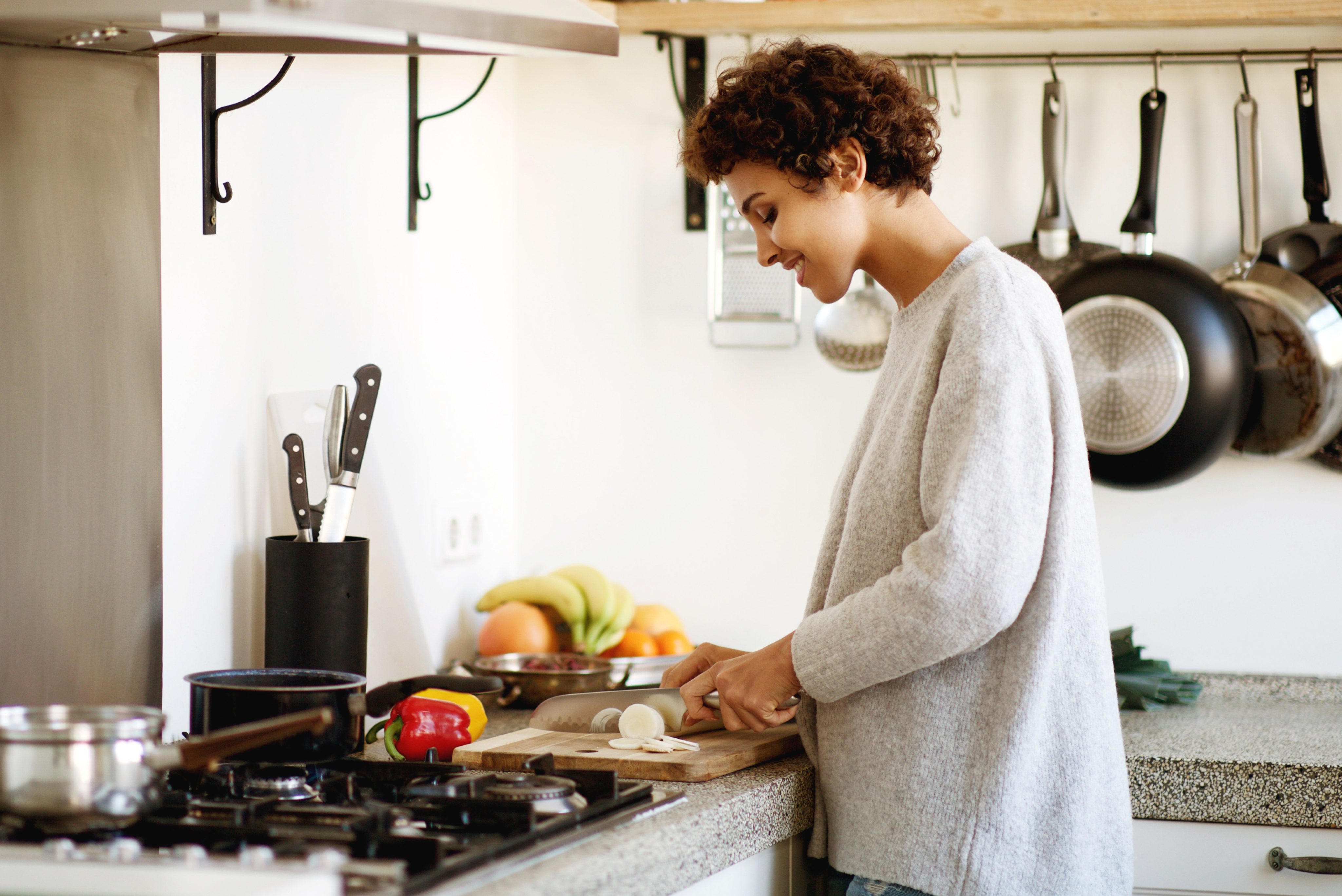 Woman cooking in kitchen